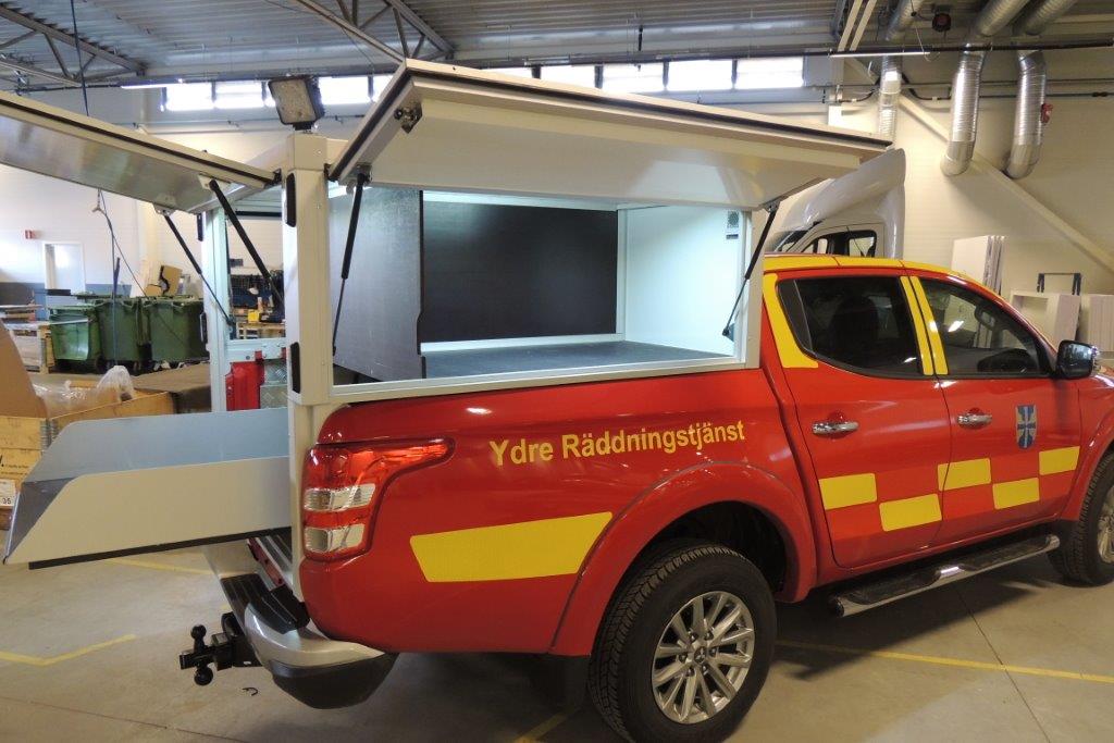 L200 brann, sett skrått bakfrafra-Y1